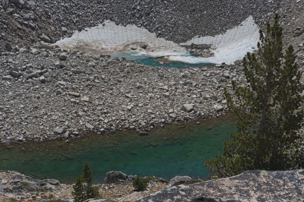 The higher two tarns, well below.
