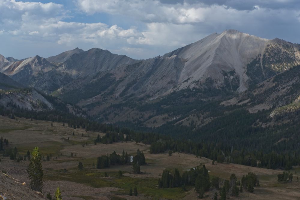 WCP-8 (10557') above the Warm Springs Creek drainage.  The constantly changing light and shadow drifting across the limestone face provide photo opps.
