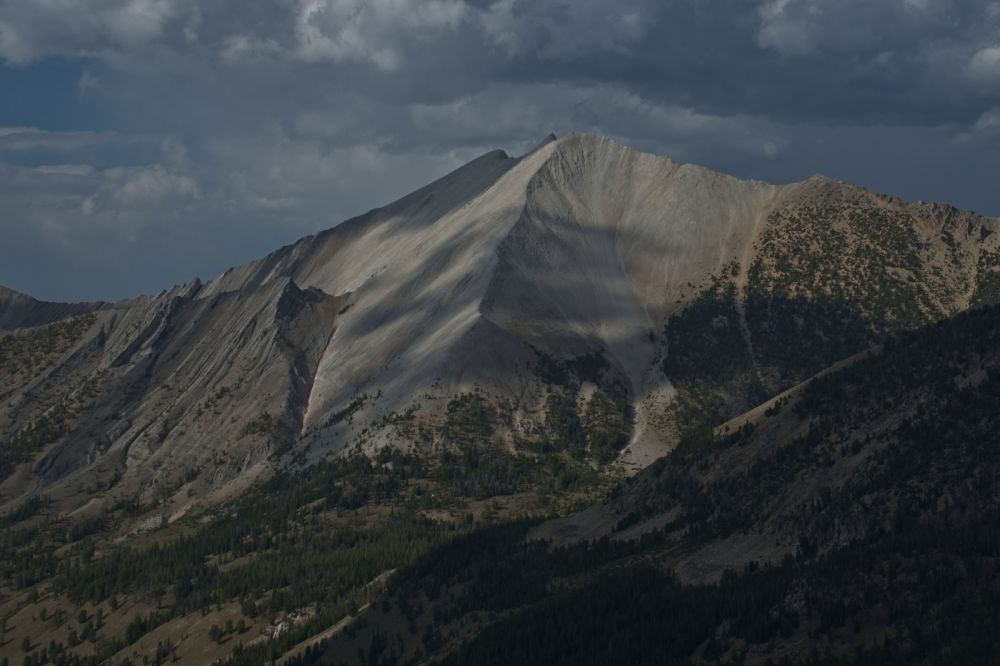 Shadows drifting across the face of WCP-8 (10557') from the top of the ridge SW of Ants Basin.  (58 mm)
