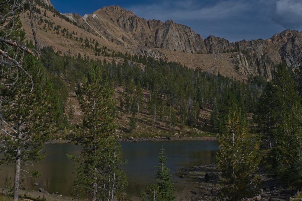 This tarn is at an elevation of 9730', well above Fourth of July Lake.  The water is a bit brackish, but will do in a pinch.  I hear from more than one party ascending from the Fourth of July trail head that the road from Stanley to Grandjean was is still closed.  I'm making good time, and will be able to make the most of the remaining light, getting to Ketchum just as it is getting dark.  I reach the trail head at 7:30 pm, completing the "epic White Cloud backpack loop" for the fourth time.
